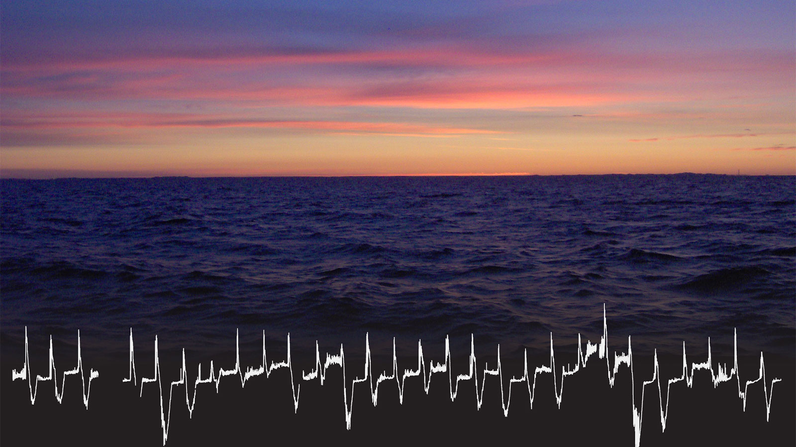 Lake Michigan sunset with graphic over the water