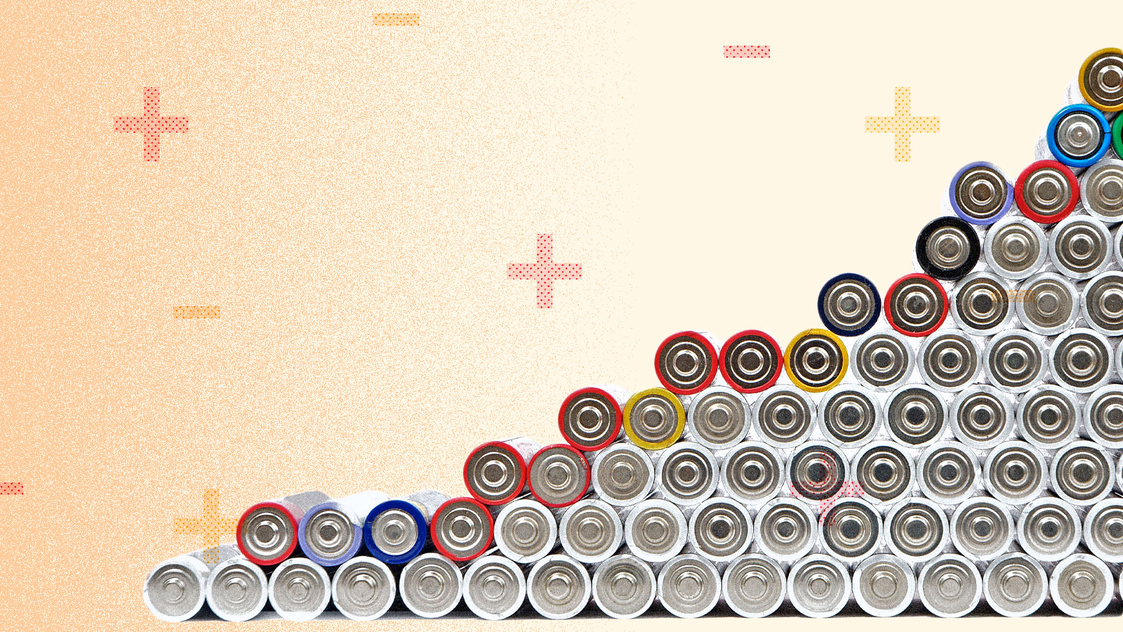 A stack of batteries with plus and minus signs