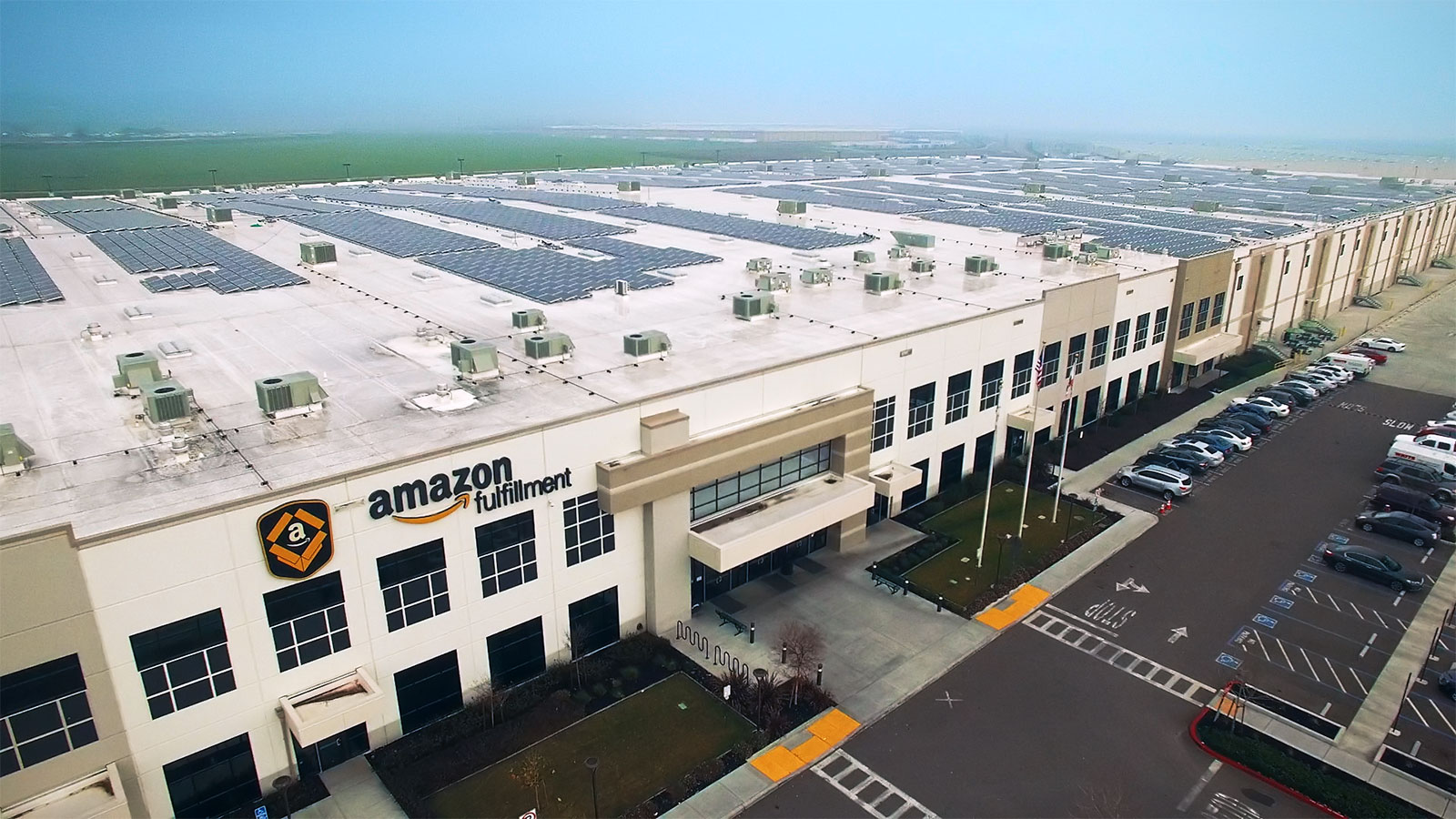 Amazon fulfillment center with solar panels on the roof