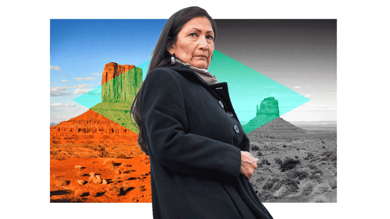Deb Haaland against a background of the Navajo Nation