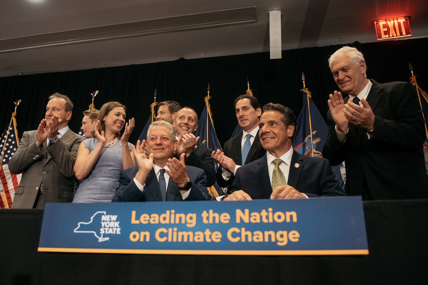 New York Governor Cuomo and Al Gore celebrate after Cuomo signed the Climate Act