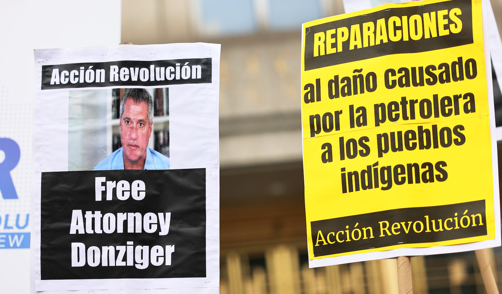 Posters call for the release of attorney Steven Donziger.