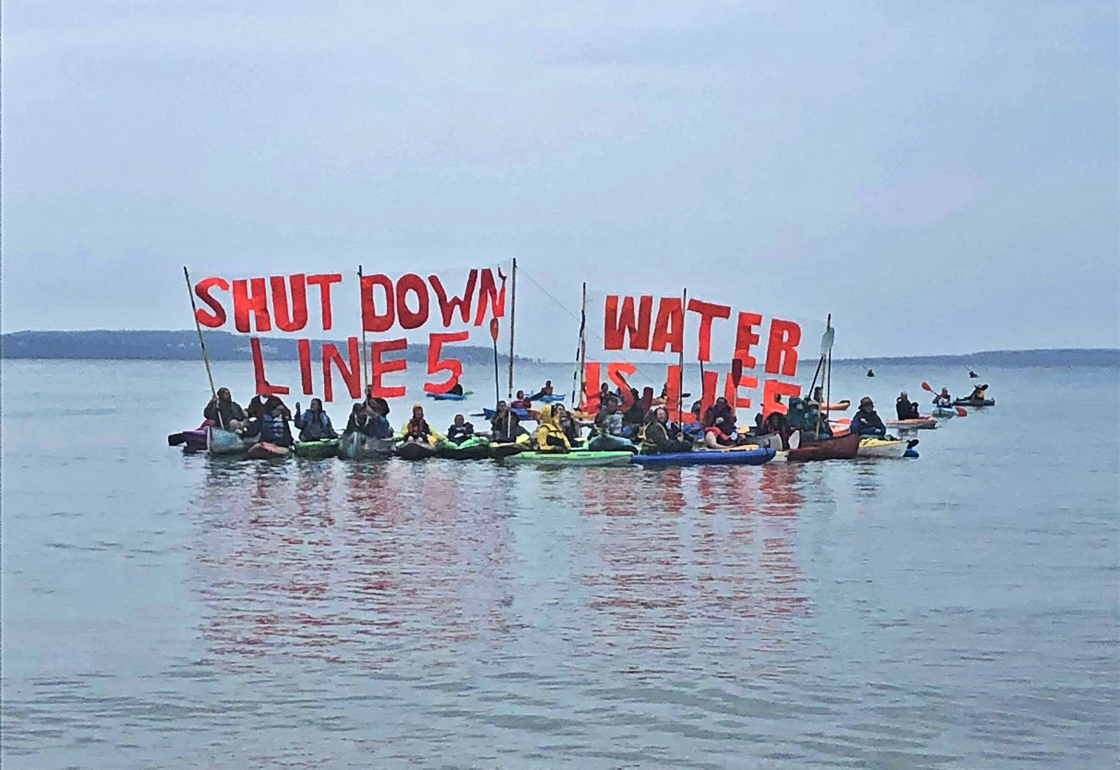 People on kayaks protesting Line 5