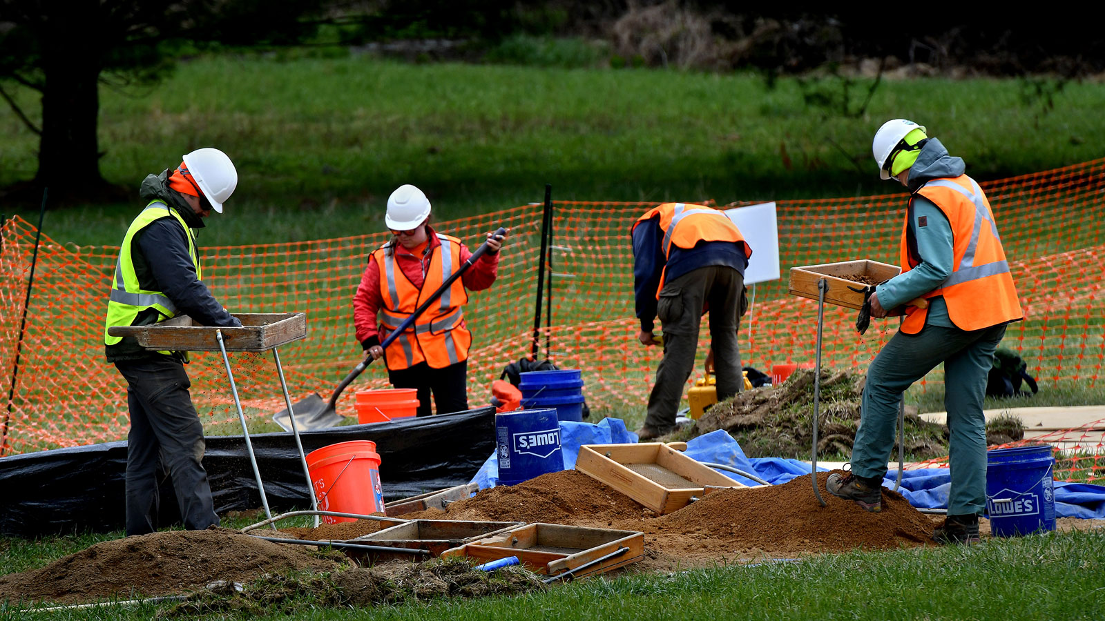 People digging for Indigenous artifacts on a pipeline construction site