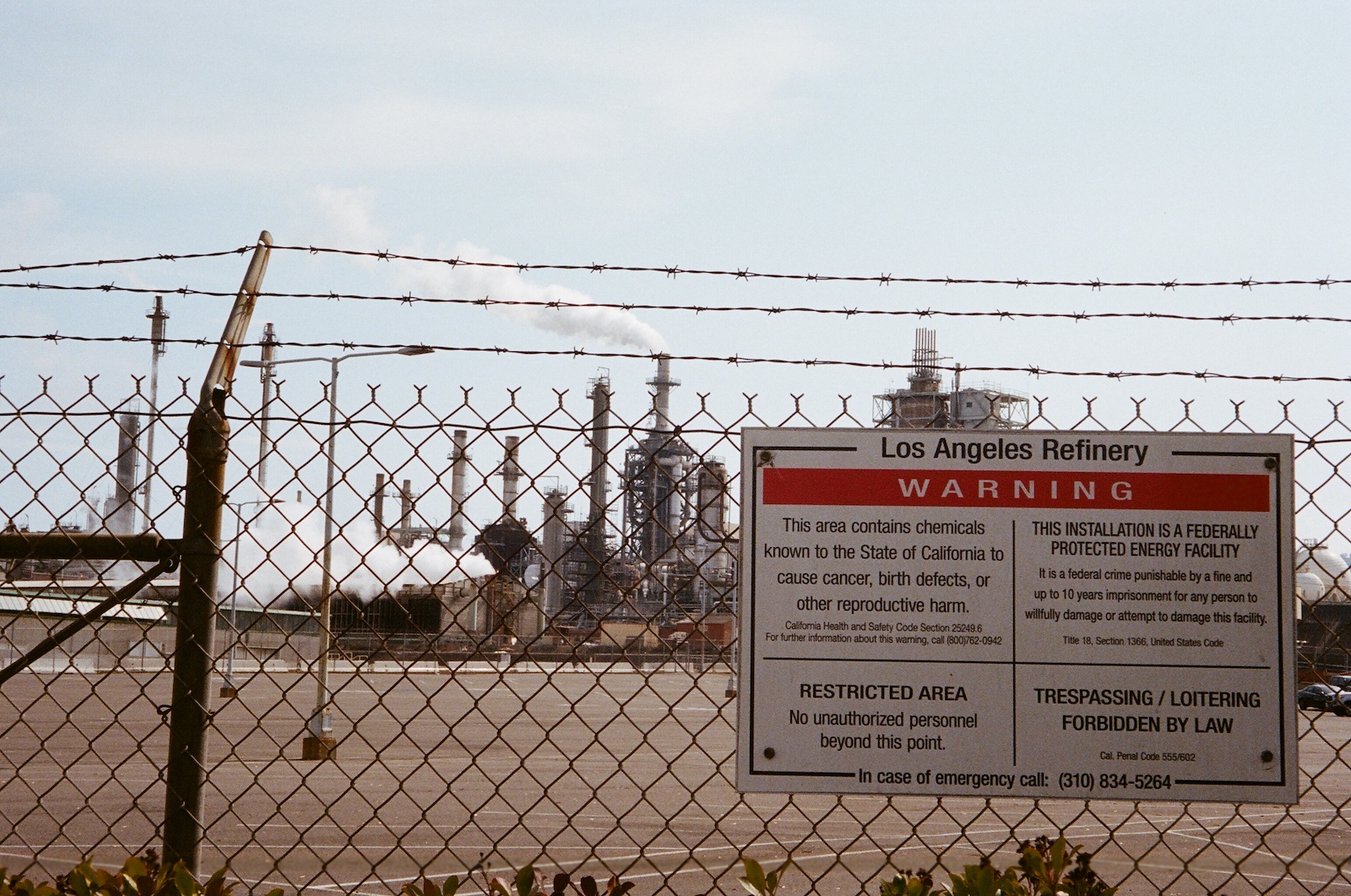 A plume of smoke and air pollution causing chemicals rises from the Los Angeles Refinery.