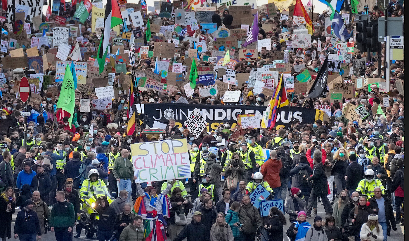 A huge mass of protesters and signs on the streets of Glasgow on Friday