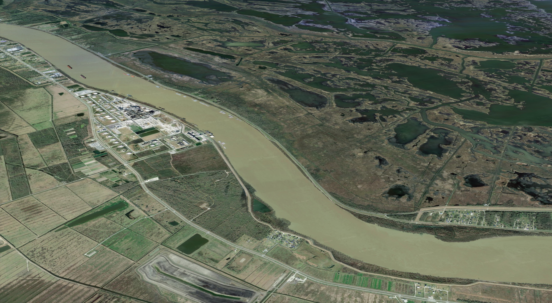 An aerial shot shows the Mississipi River at a tilt.