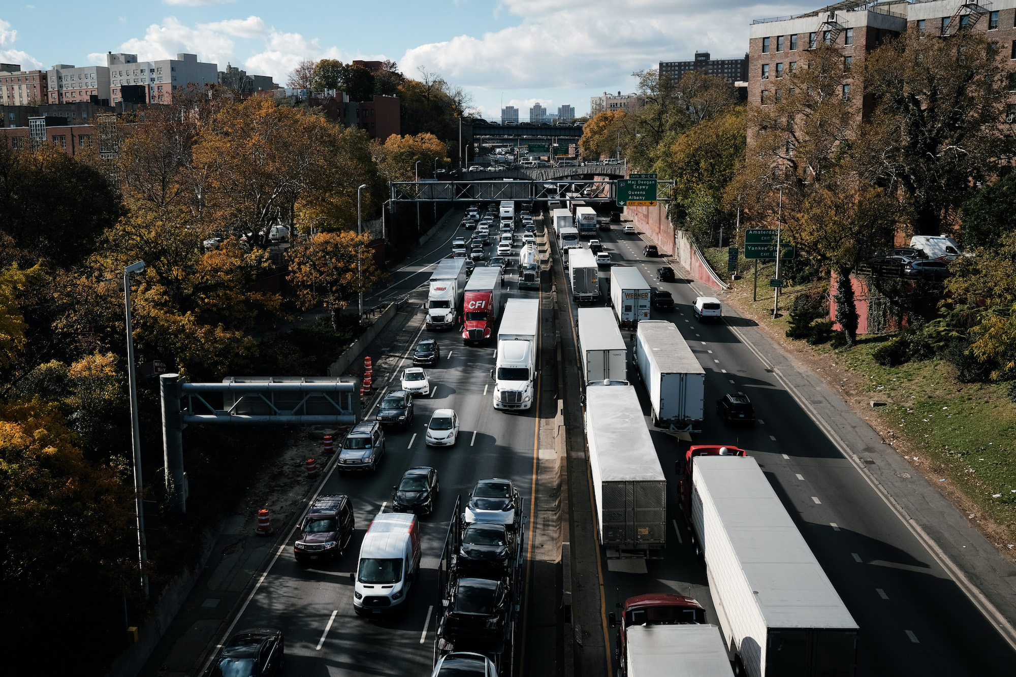 A long line of cars and trucks move along a notorious stretch of highway in New York City's Bronx.