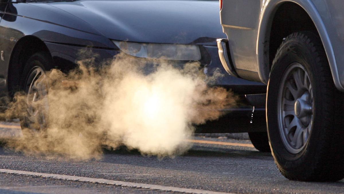 Smoke coming out of the tailpipe of a car