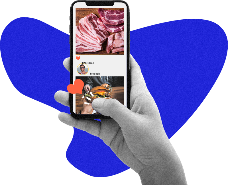 Hand holding phone with social media feed of pictures of meat