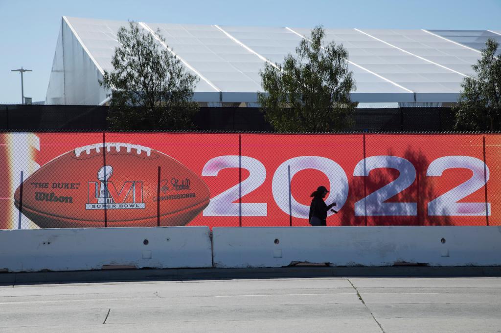 Event tents and stages at SoFi Stadium will worsen the scarcity of parking spaces for Super Bowl Sunday. Nearby home and business owners will open their property for parking but for a very steep price.
