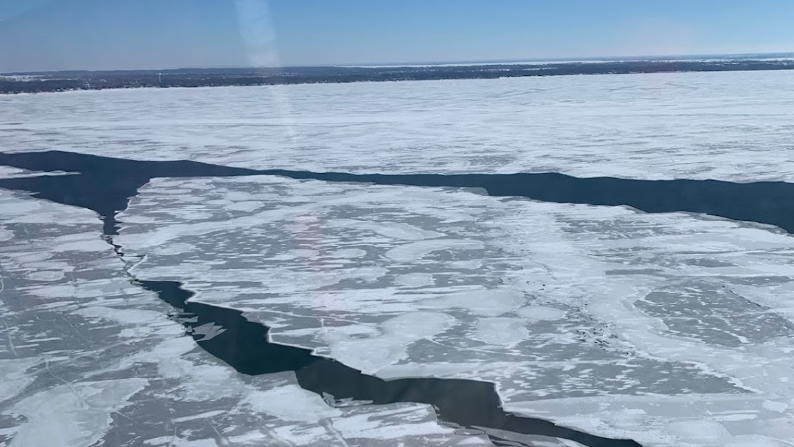 Cracking ice on Lake Erie captured by a Coast Guard helicopter.