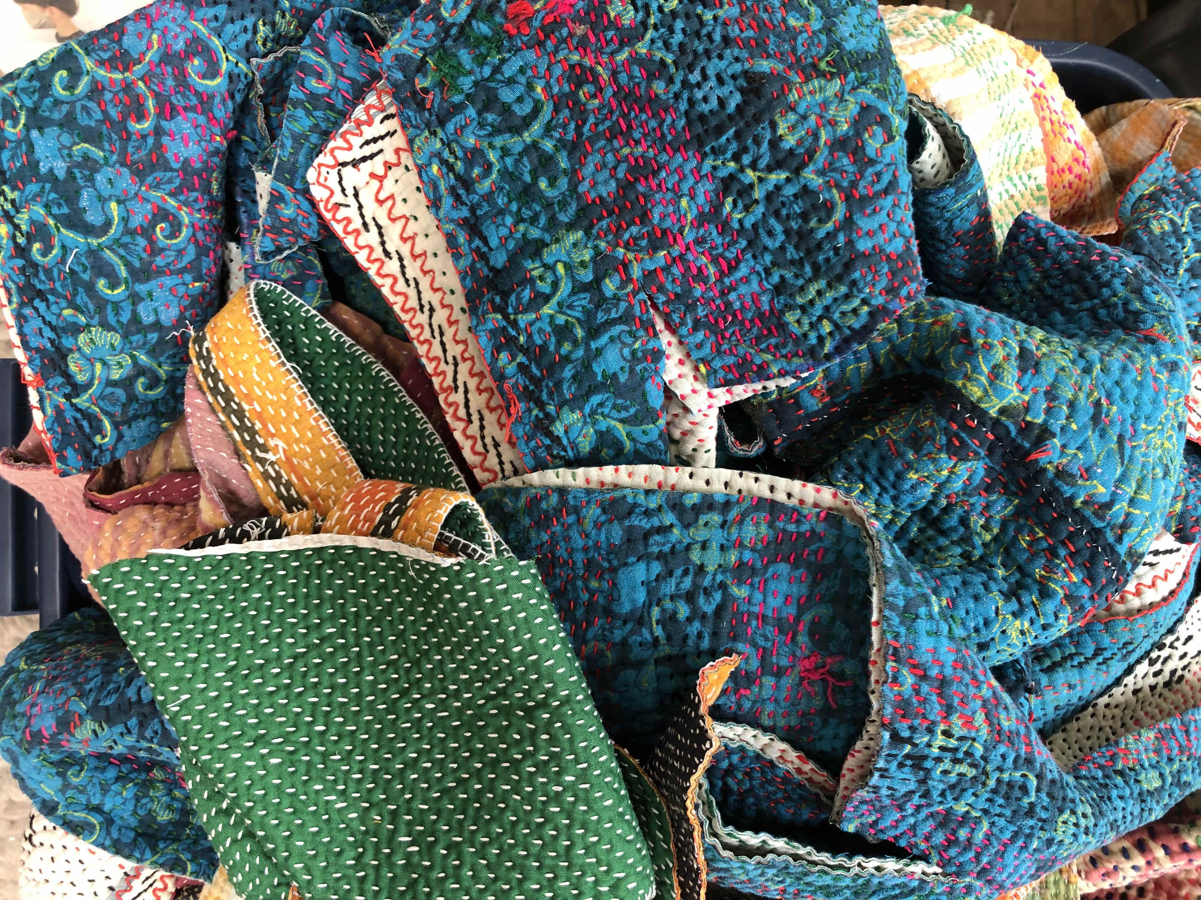 Multicolored and patterned mixed textiles with stitching