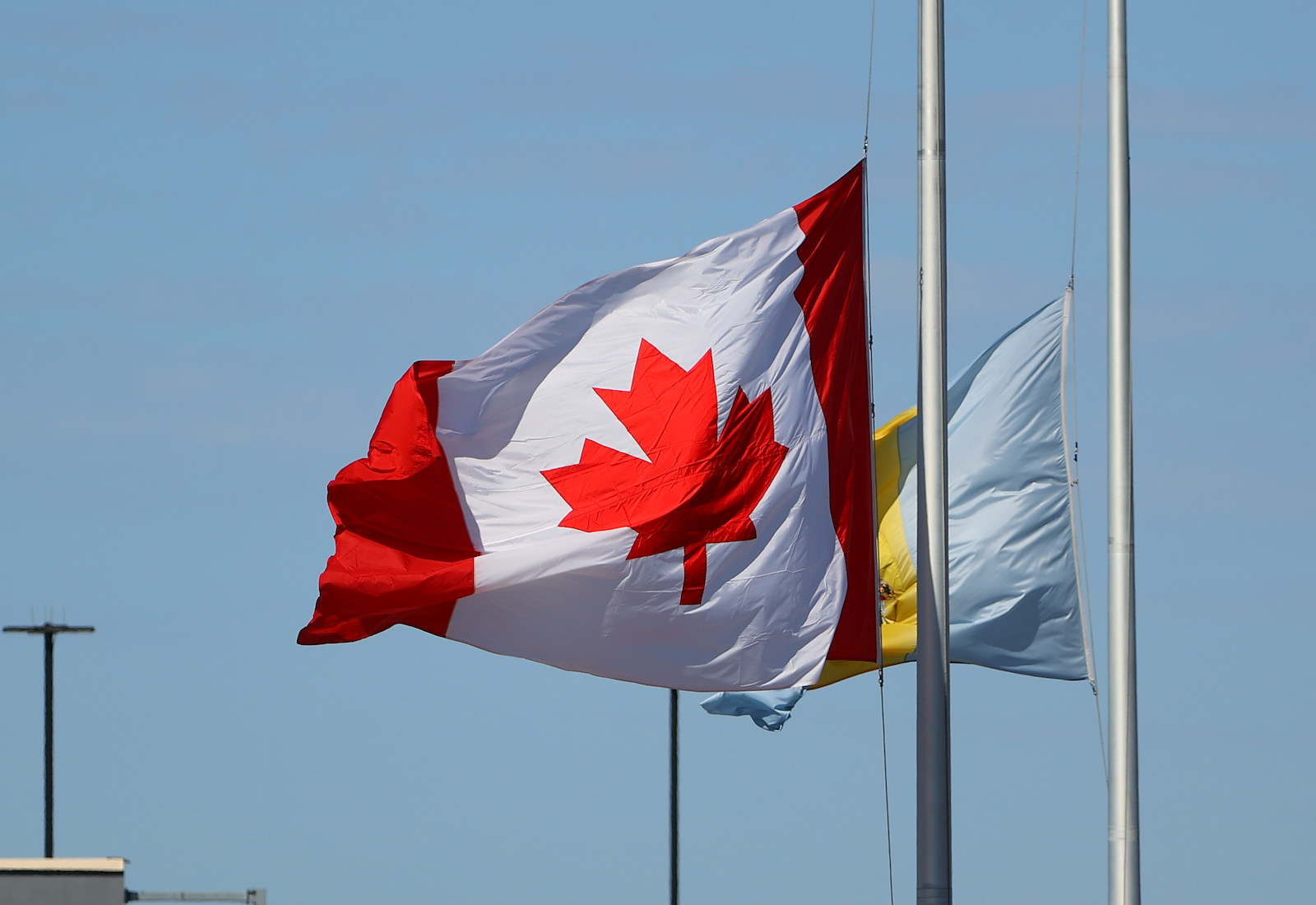 Canadian flag flapping in the wind
