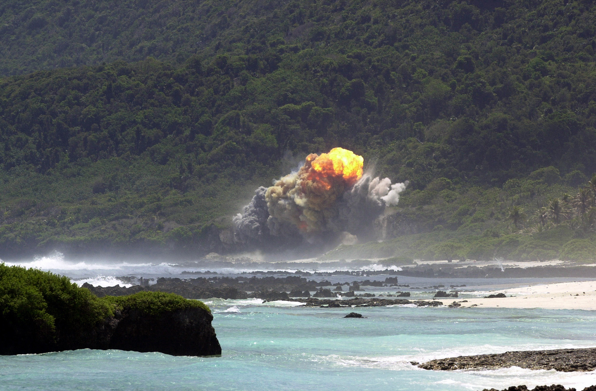 A large explosion on a beach