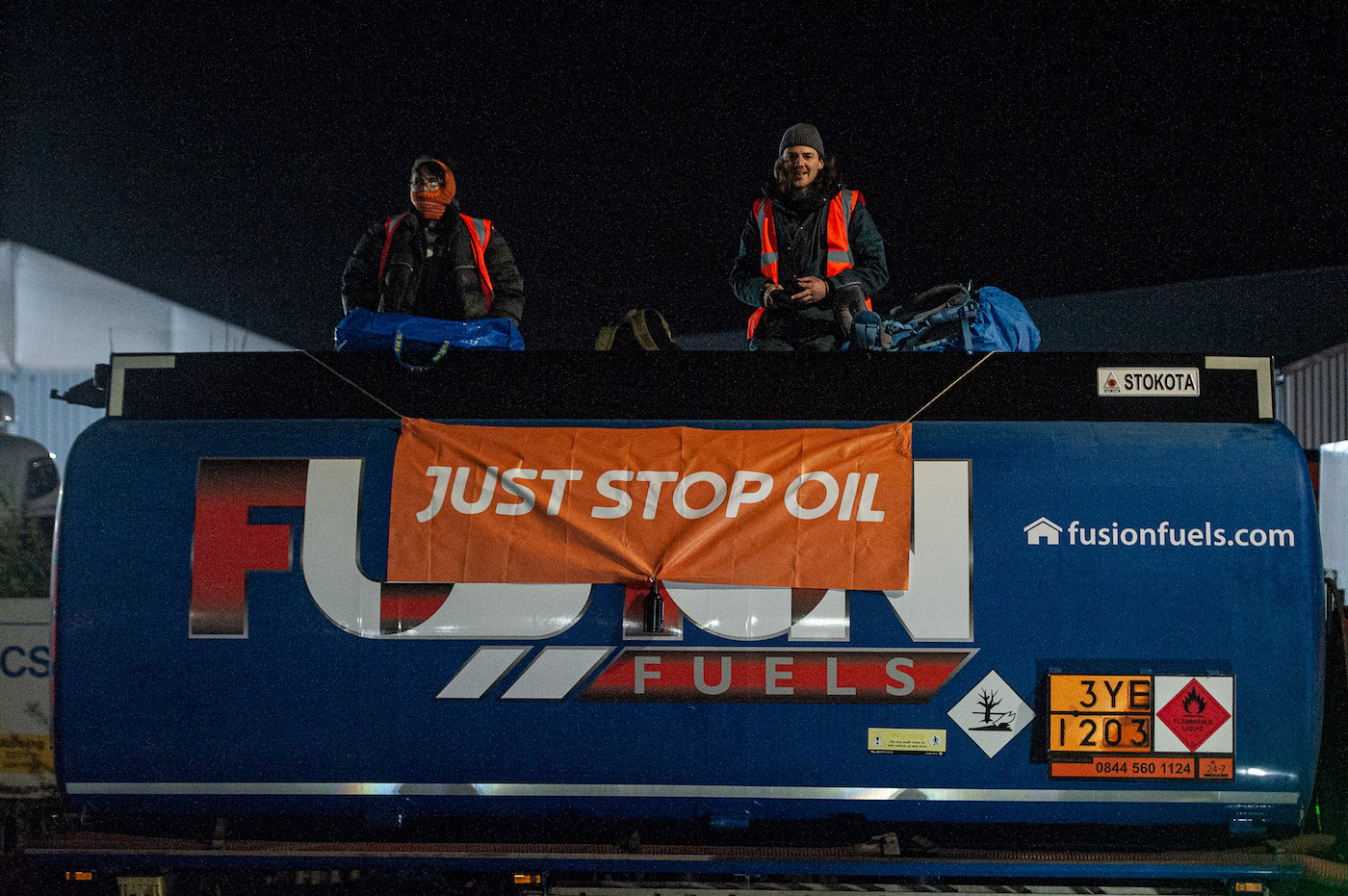 Activists from 'Just Stop Oil' close down the Gray's Inter Terminals by boarding fuel haulage vehicles on April 1, 2022 in Grays, England