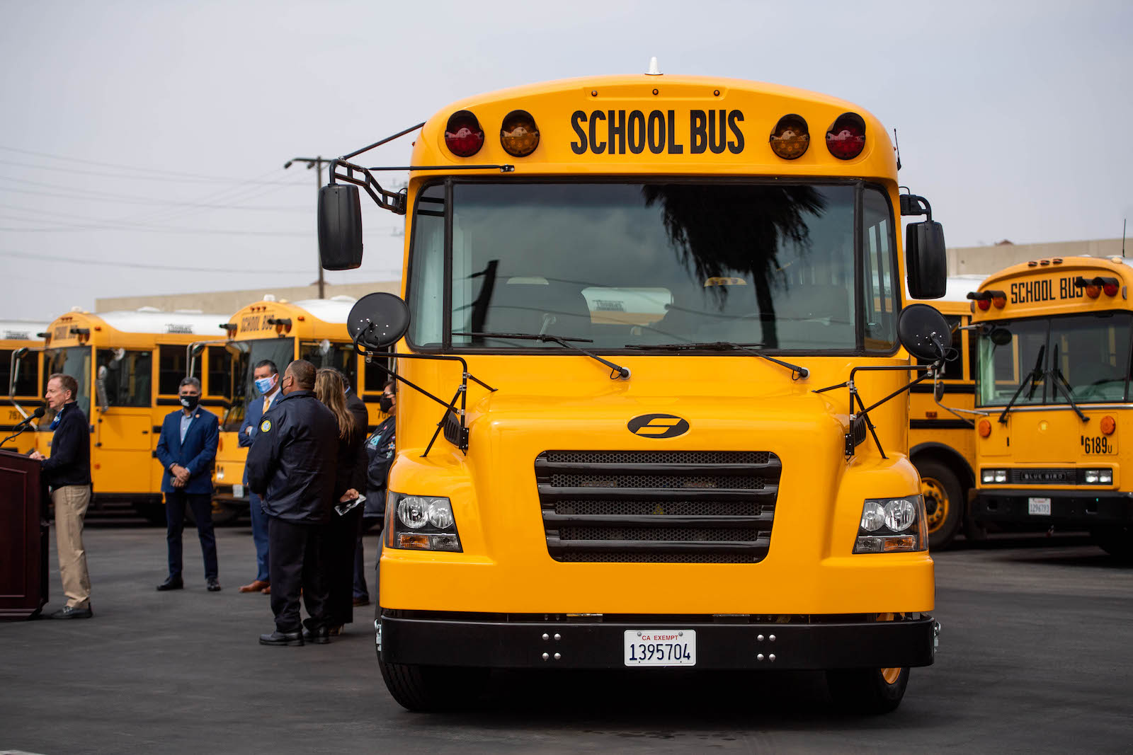 a big electric yellow school bus
