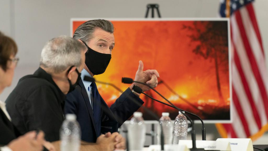 In this Sept. 14, 2020, file photo, California Gov. Gavin Newsom speaks about wildfires during a briefing with then President Donald Trump at Sacramento McClellan Airport in McClellan Park, Calif.