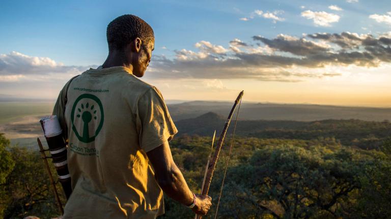 Hadza scout Ezekiel Phillipo overlooking Tanzania's Yaeda Valley.
