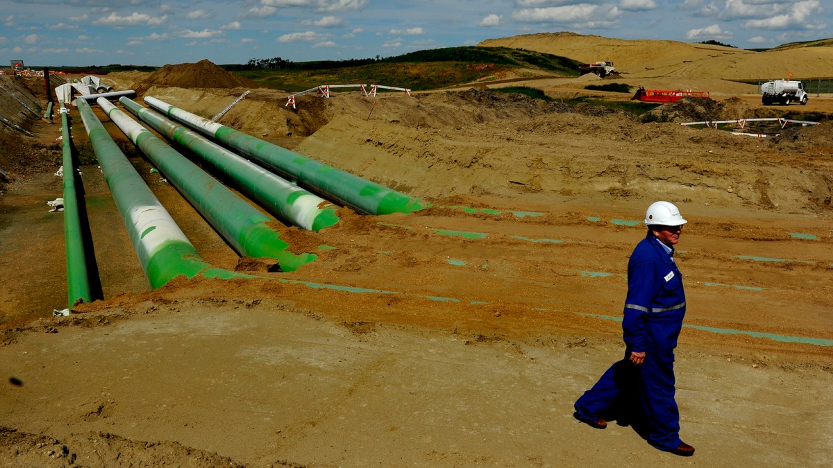 Green pipelines under construction for the Keystone XL pipeline in Alberta, Canada.