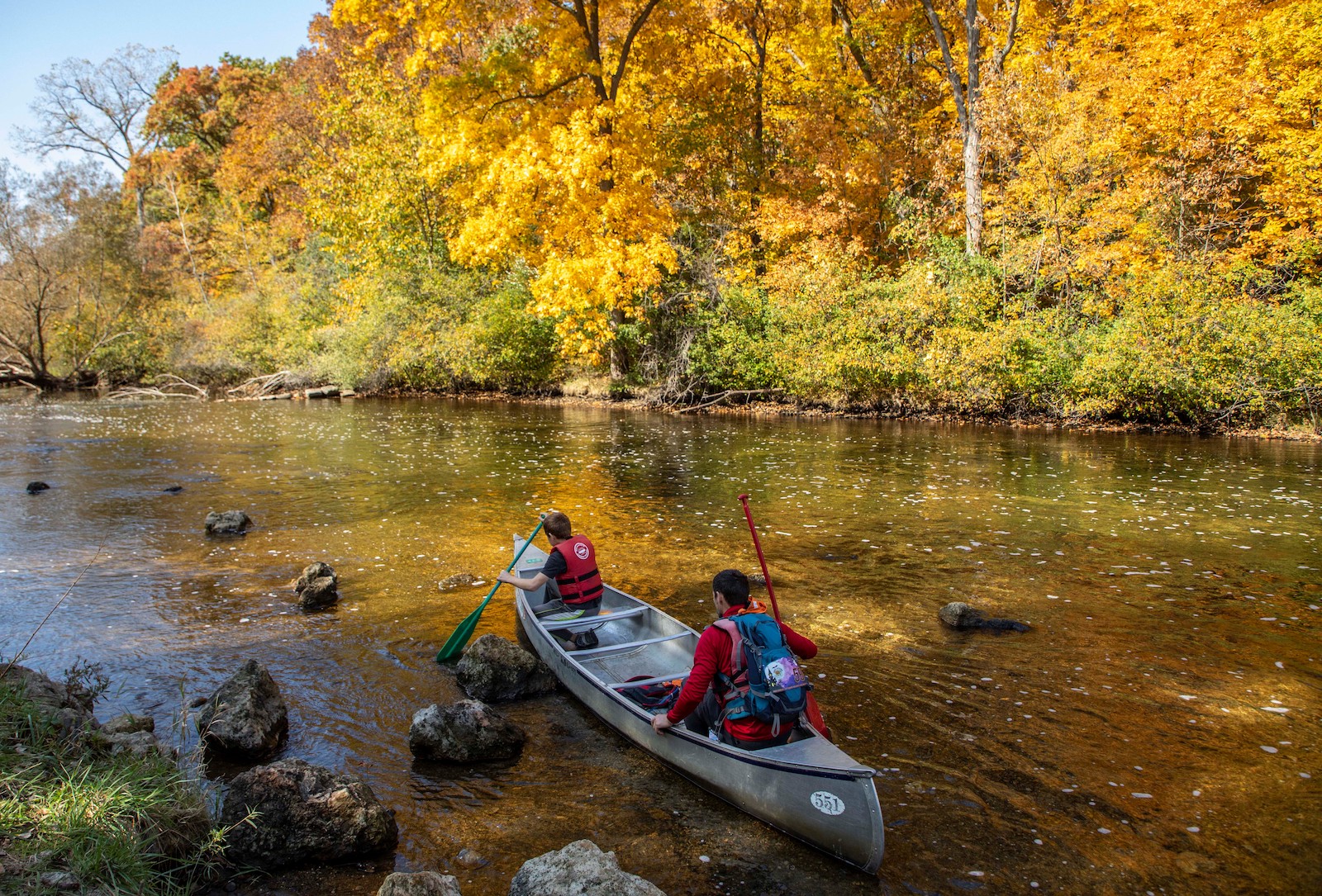 Canoers set off on the Hudson River to enjoy fall foliage at the Island Lake Recreation Center in Livingston County of Michigan, the United States, on Oct. 11, 2020.