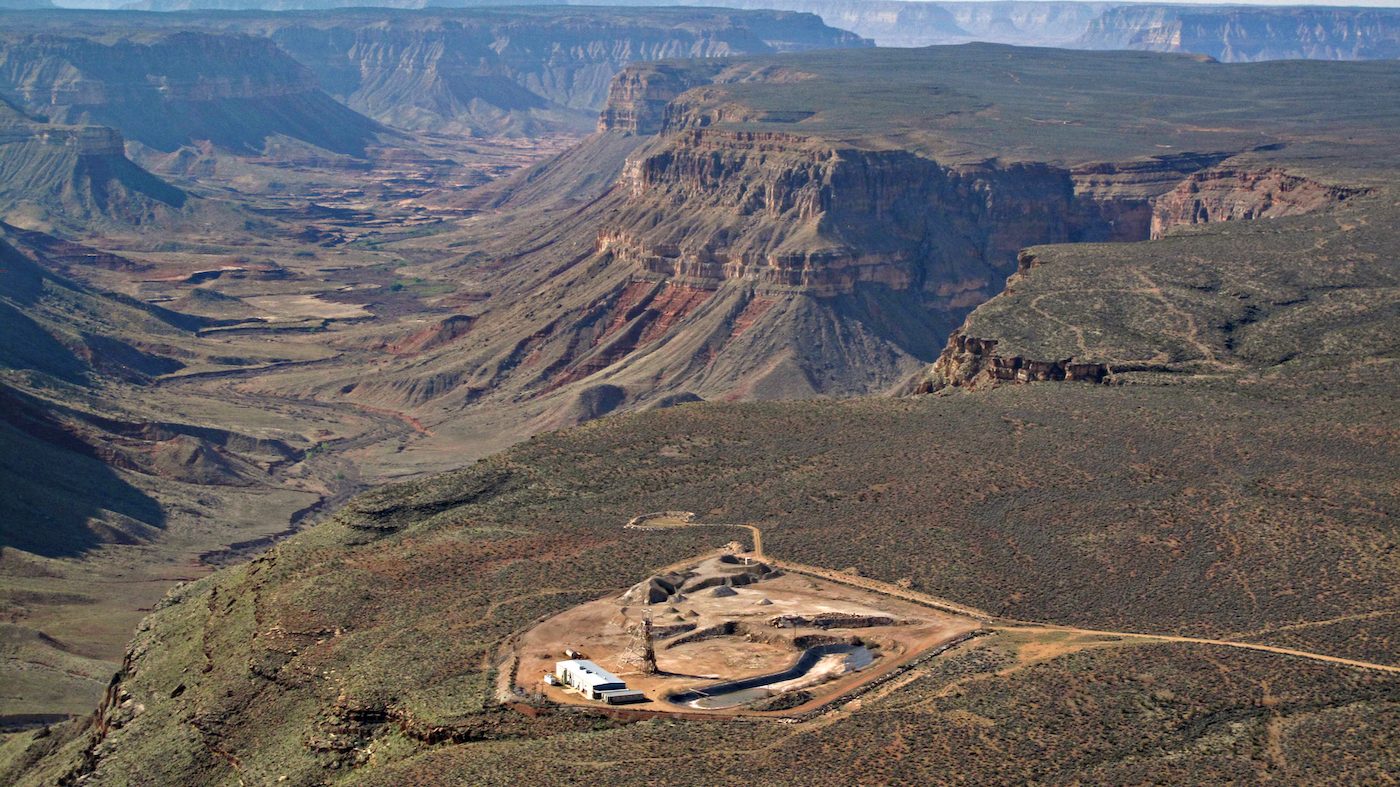 aerial view of mine complex next to grand canyon