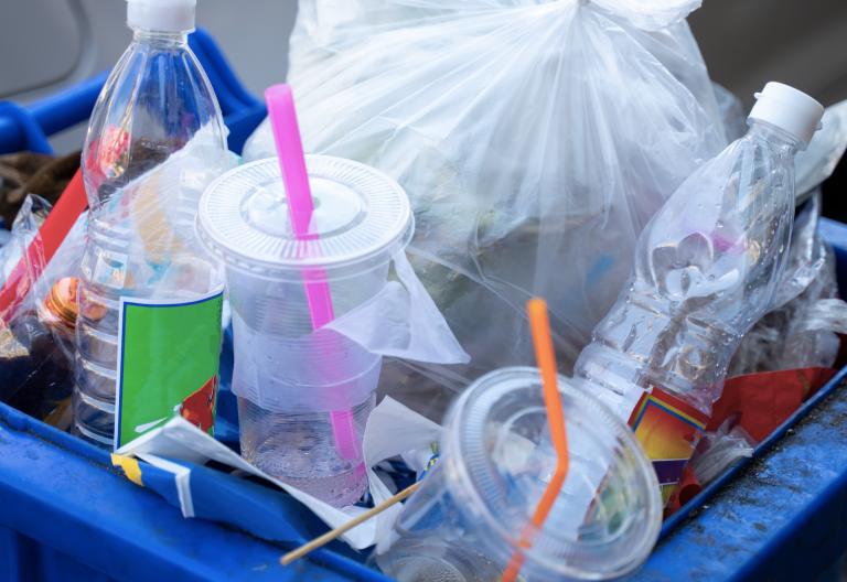 Plastic cups and other garbage in a pile