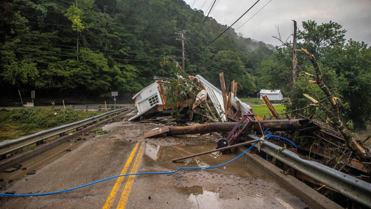A house rests on a bridge near the Whitesburg Recycling Center in Letcher County, Kentucky, on Friday, July 29, 2022.