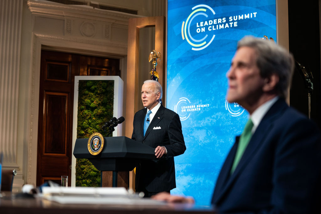 Joe Biden and climate envoy John Kerry at podiums
