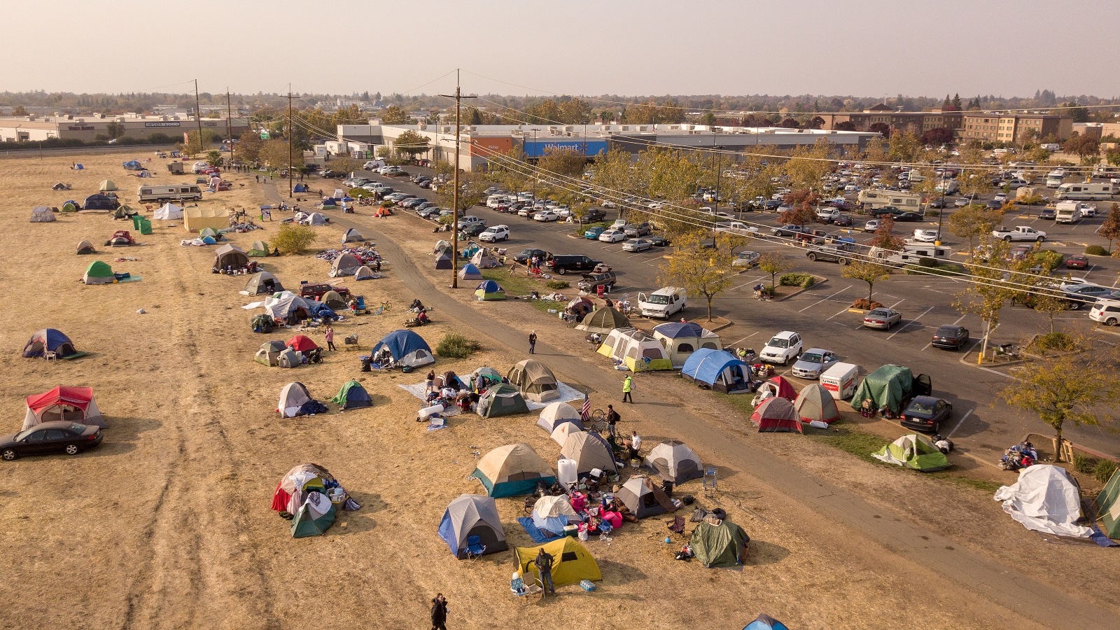 A evacuee encampment at a Walmart parking lot in Chico, California.