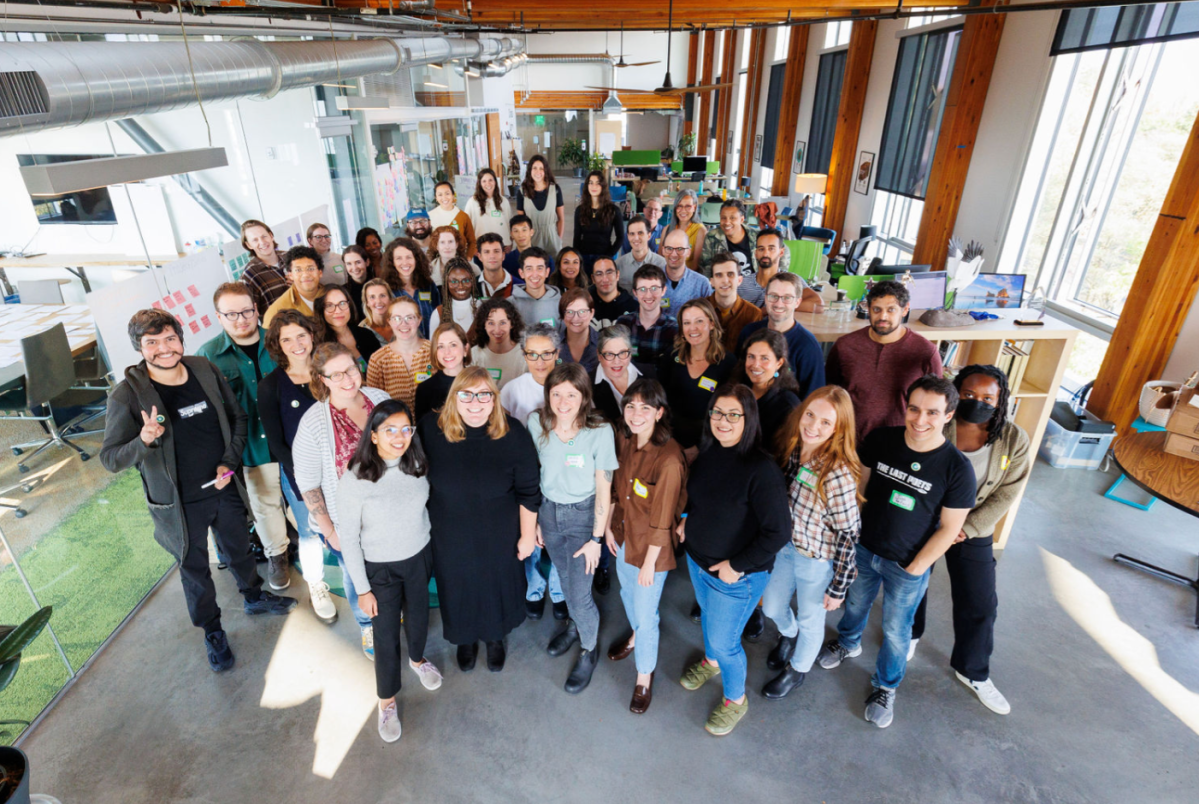 The Grist staff stands in a group in Grist's Seattle office.