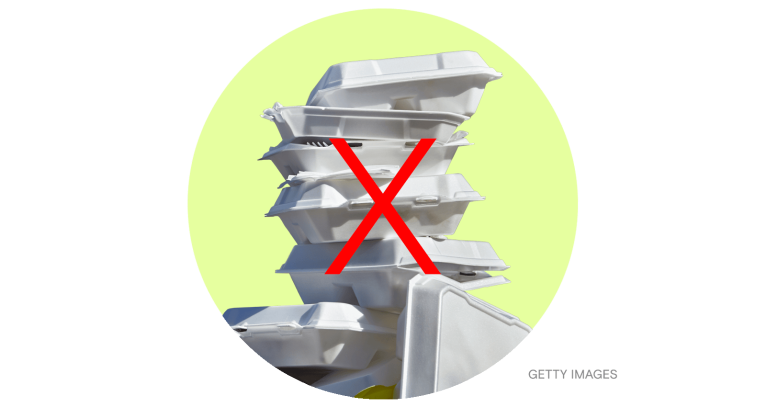 A pile of discarded styrofoam food containers