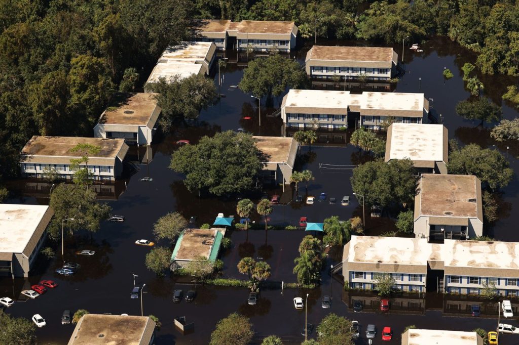 an aerial image shows flood damage in apartment complex in Orlando Florida after Hurricane Ian in September, 2022.