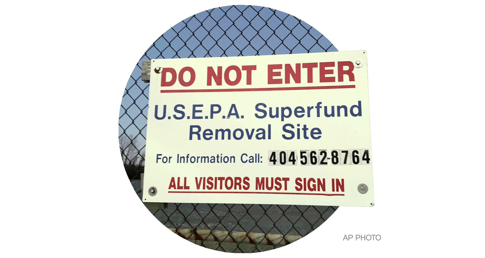 A sign identifies the Superfund removal site on the property of a former high school in Birmingham, Alabama