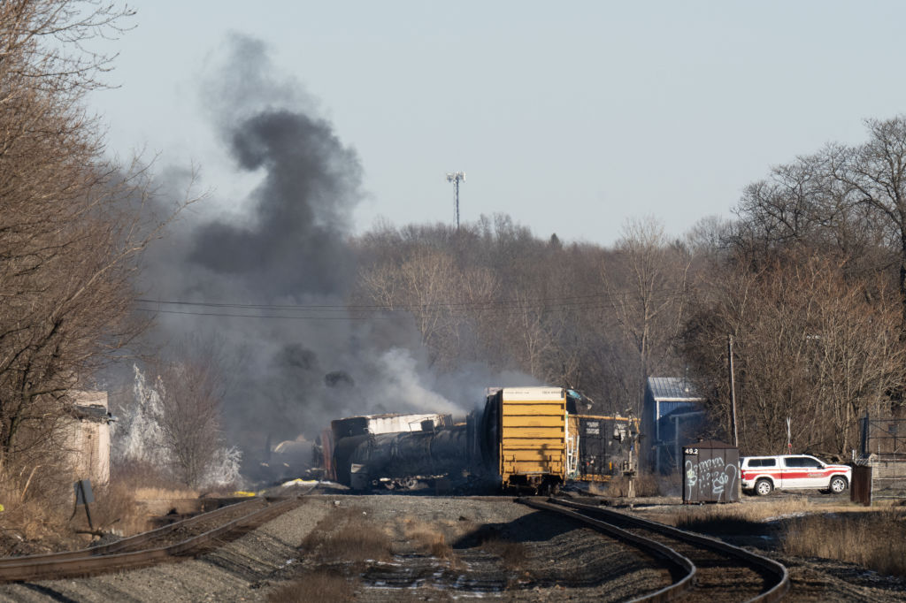 Billowing smoke from a derailed train