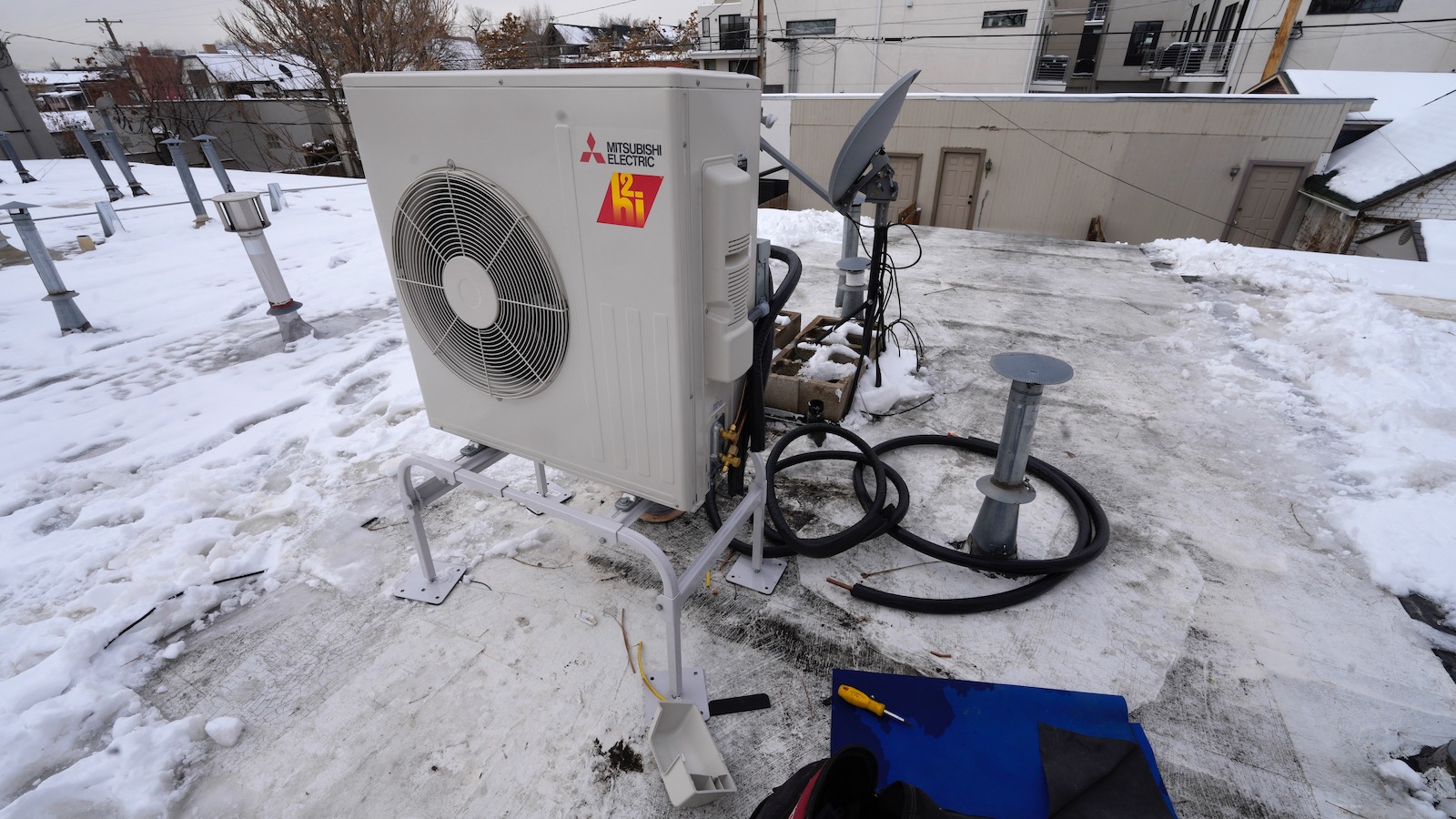 https://grist.org/wp-content/uploads/2023/02/heat-pump-in-winter.jpeg