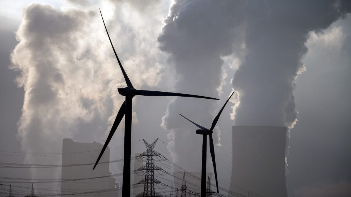 Wind turbines with coal plant pollution