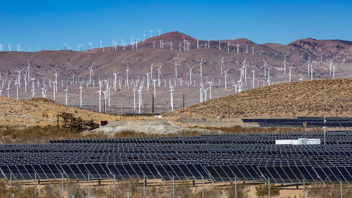 Solar panels and wind turbines on November 15, 2022, near Mojave, California.
