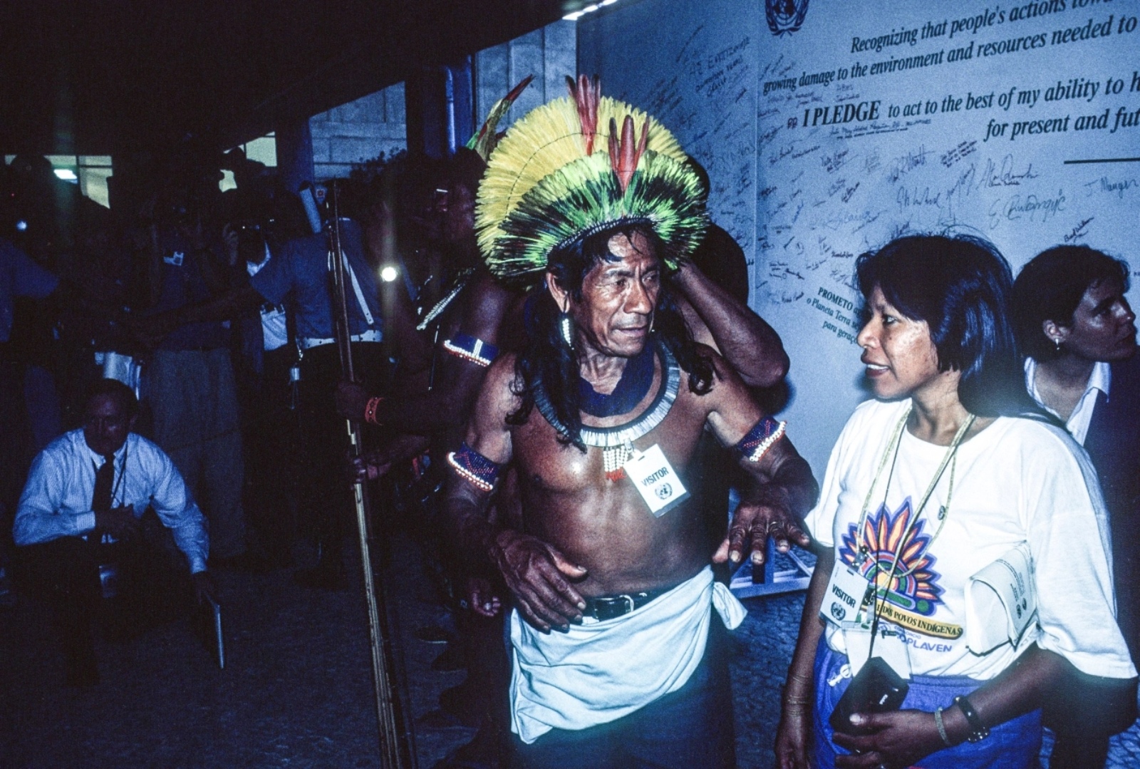 Indigenous environmentalist Raoni Metuktire, a chief of the Kayapo people in Brazil, talks to a participant at the 1992 UN Earth Summit in Rio.