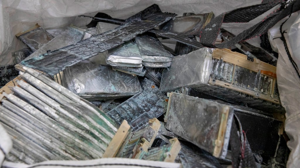 Corroded and damaged electric vehicle batteries at the Ascend Elements electric vehicle recycling plant in Covington, Georgia, March 31, 2023.