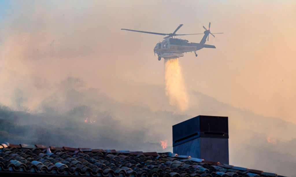 Helicopter puts out fire