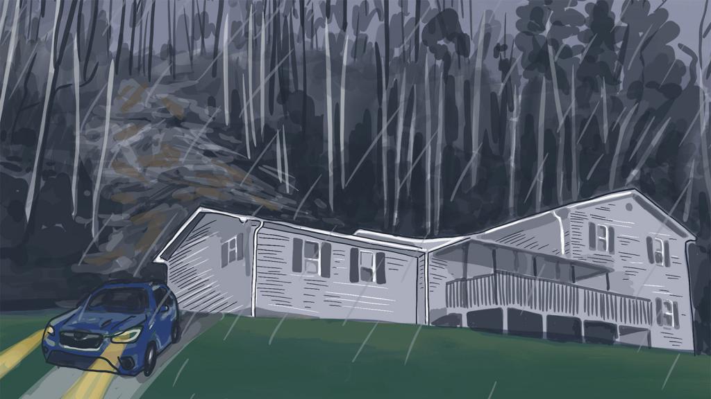 Rain pounds down on a wall of mud almost 8 feet tall that had slammed against the home’s vinyl siding.