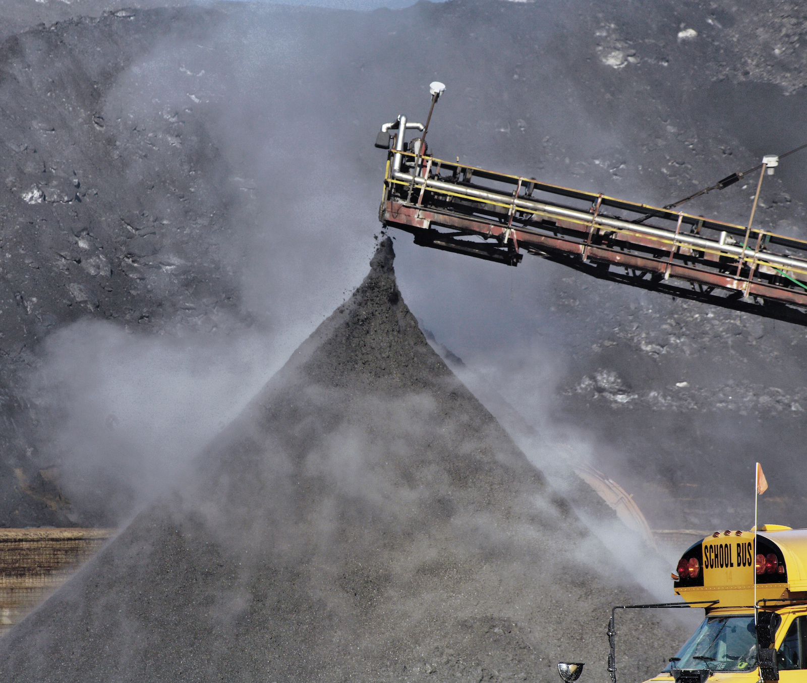 A school bus passes a coal ash pit in Louisville, Kentucky.