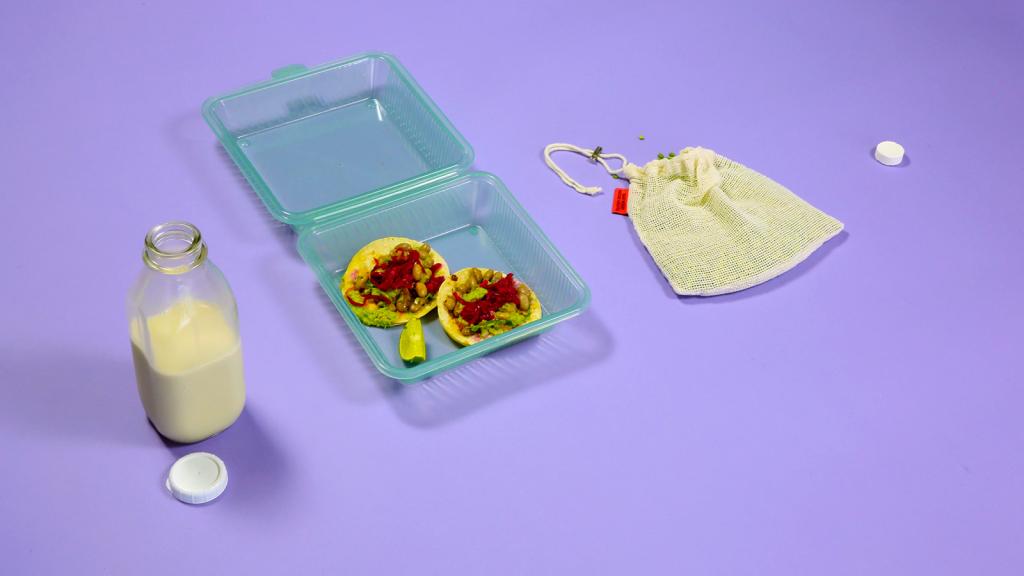 Refillable and reusable containers with milk, tacos, and lentils