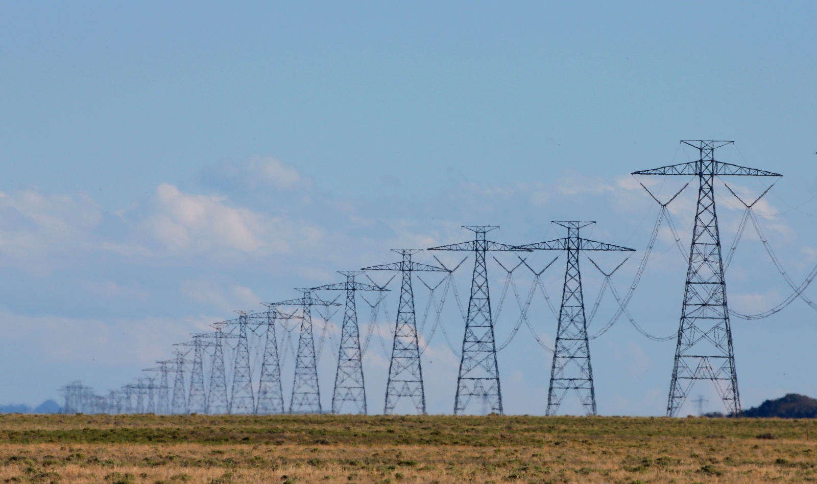 Transmission lines move power from a wind farm outside Milford, Utah.