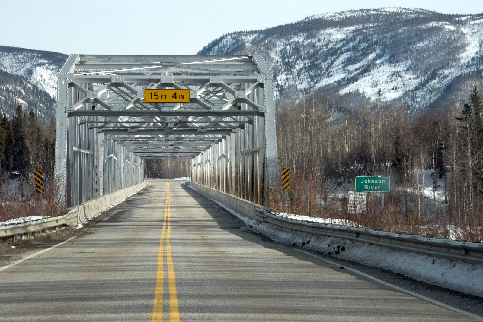 a metal bridge and highway