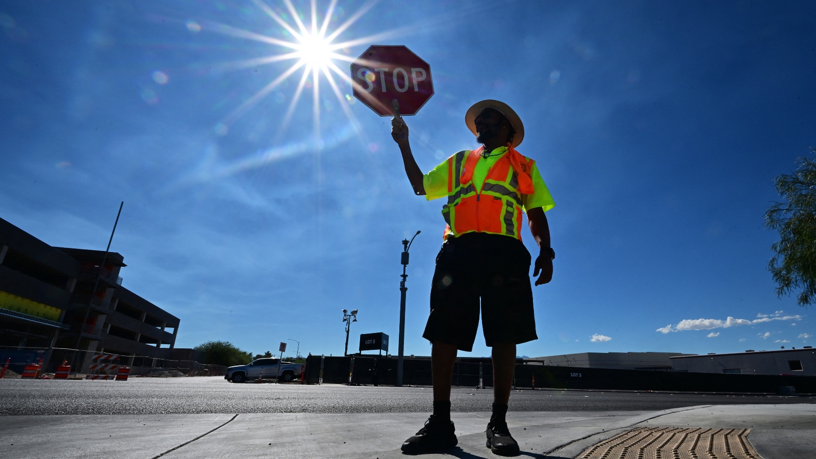 Traffic warden Rai Rogers mans his street corner during a shift under the hot sun in Las Vegas, Nevada.