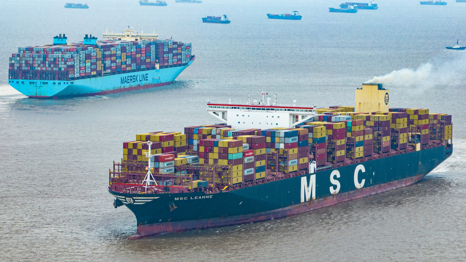 A large cargo ship floating on the water