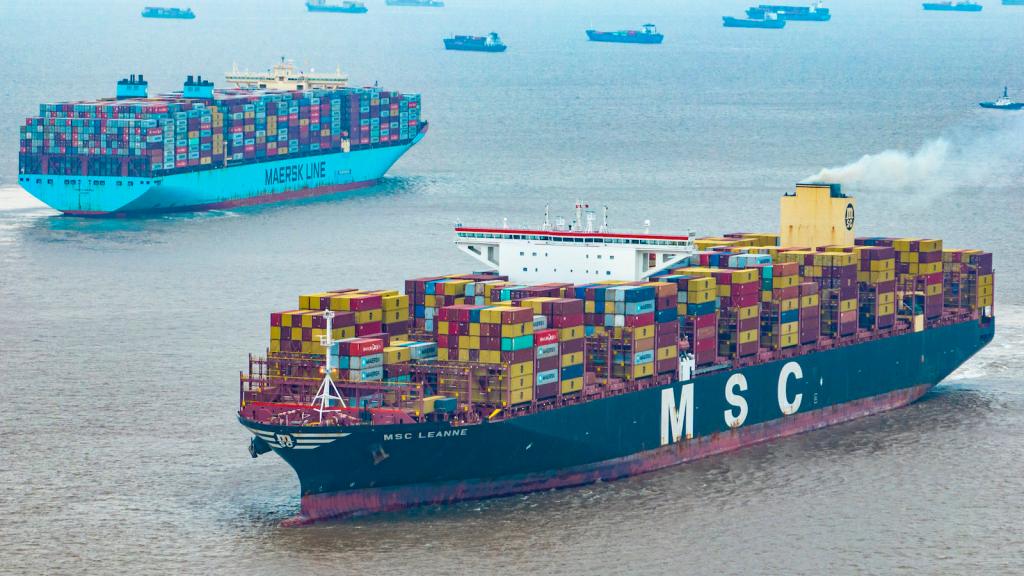 A large cargo ship floating on the water