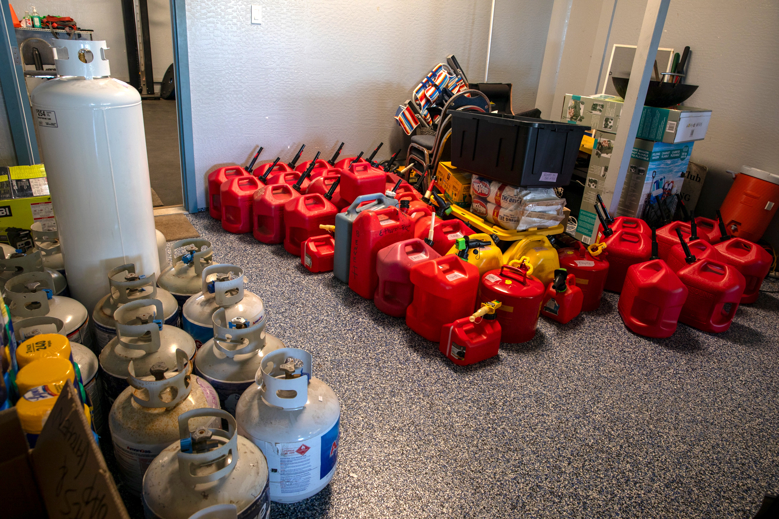 gas cannisters and propane tanks in a sorage room